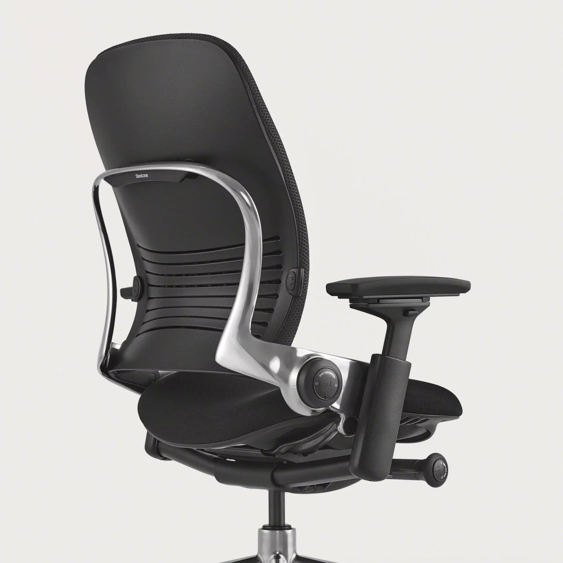 Close-up of the Leap Plus seat cushion showing contoured foam and fabric upholstery detail